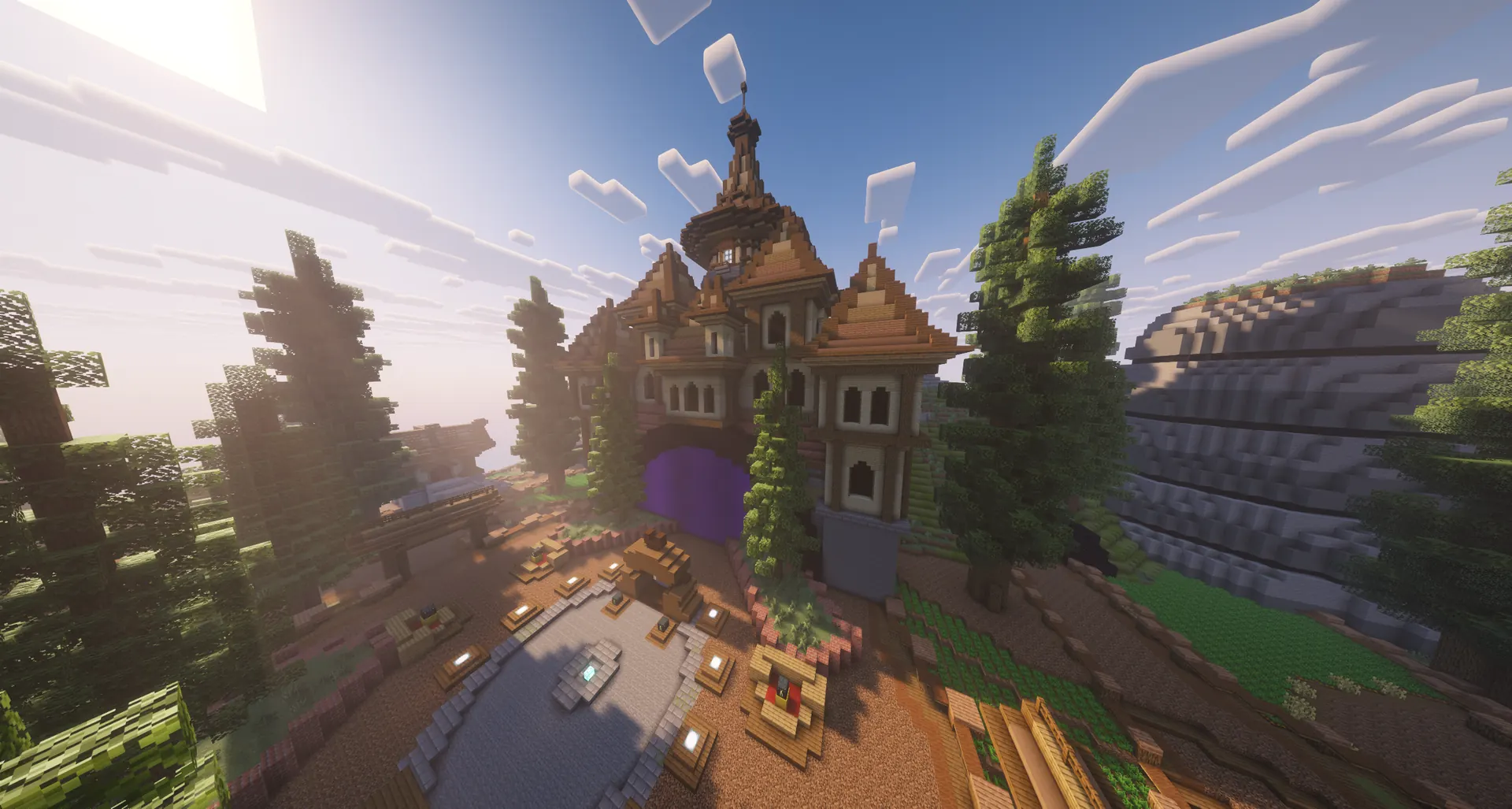 Lobby de Craftland: castillo medieval con portal morado entre abetos